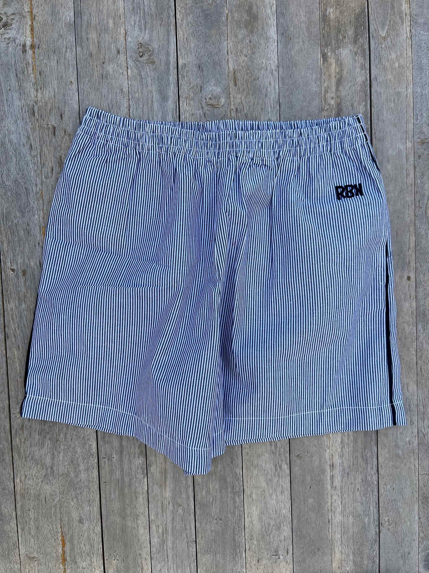 Girls Shorts `Bondi´ Dark Blue/White with stripe on the side