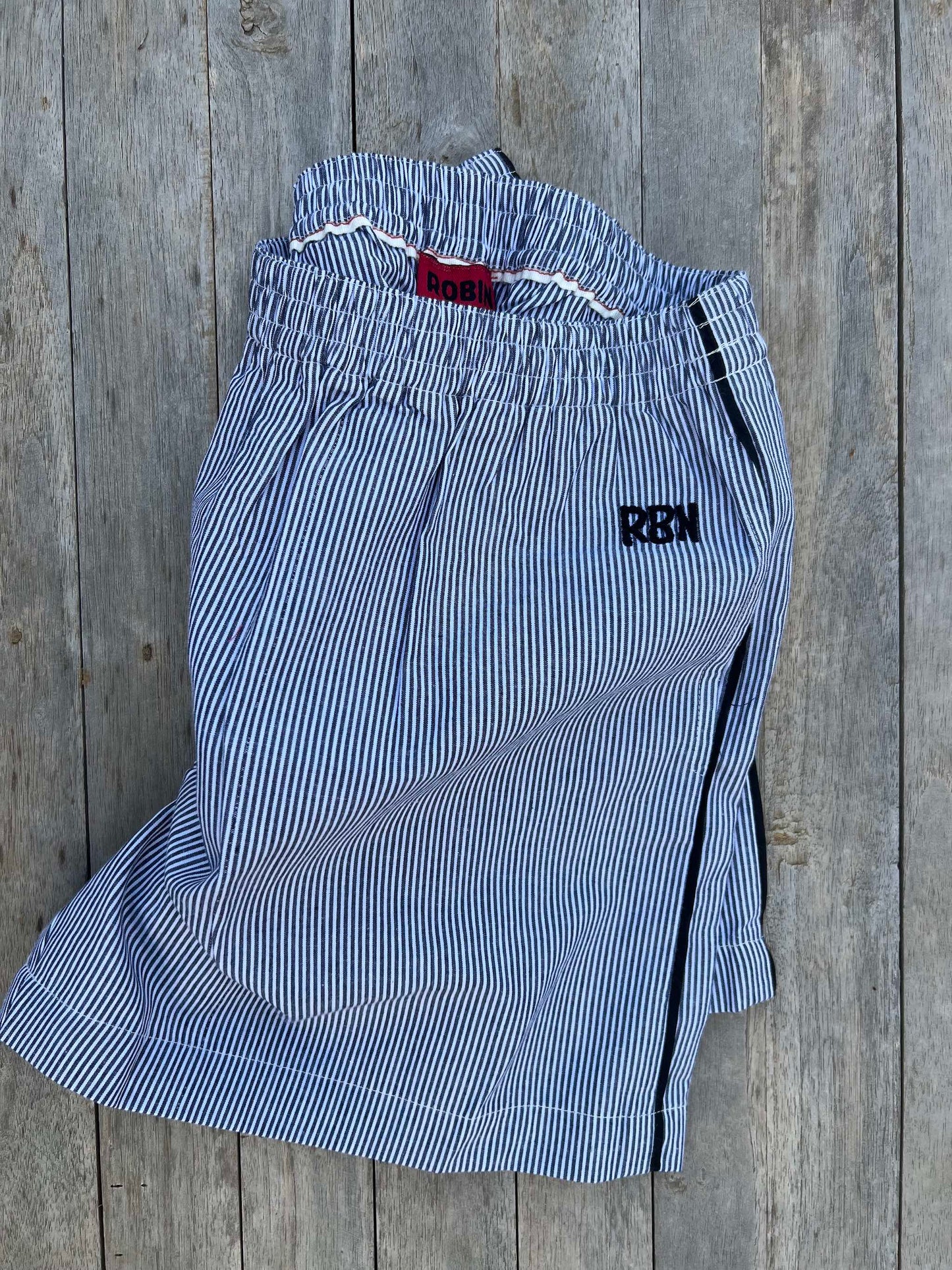 Girls Shorts `Bondi´ Dark Blue/White with stripe on the side