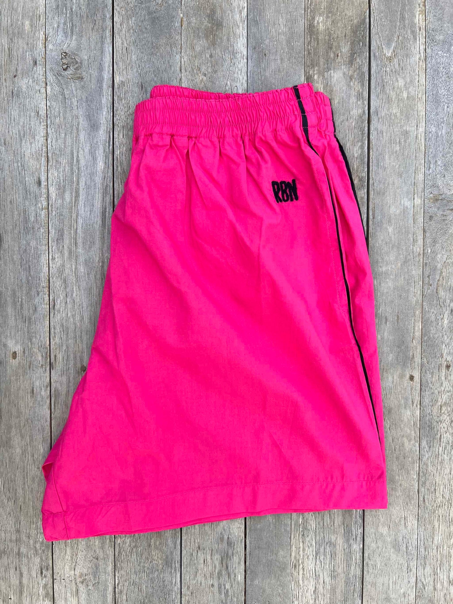 Girls Shorts `Bondi´ Pink with stripe on the side